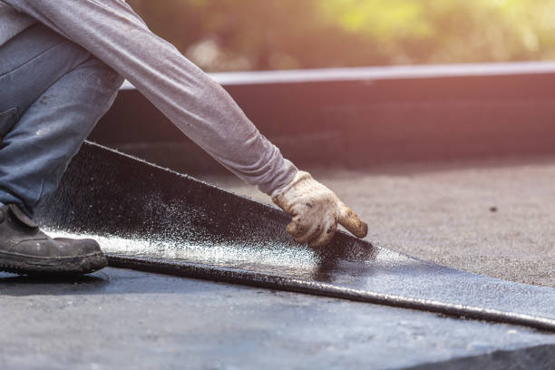 Professional Basement Waterproofing technician working in Rochester, MN